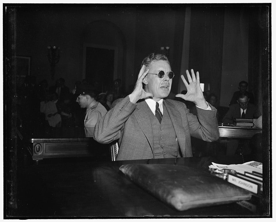 George Deatherage testifies before Congress in 1939, facing accusations of plotting a fascist insurrection after the 1940 US election, a historically significant but obscure interwar conspiracy.