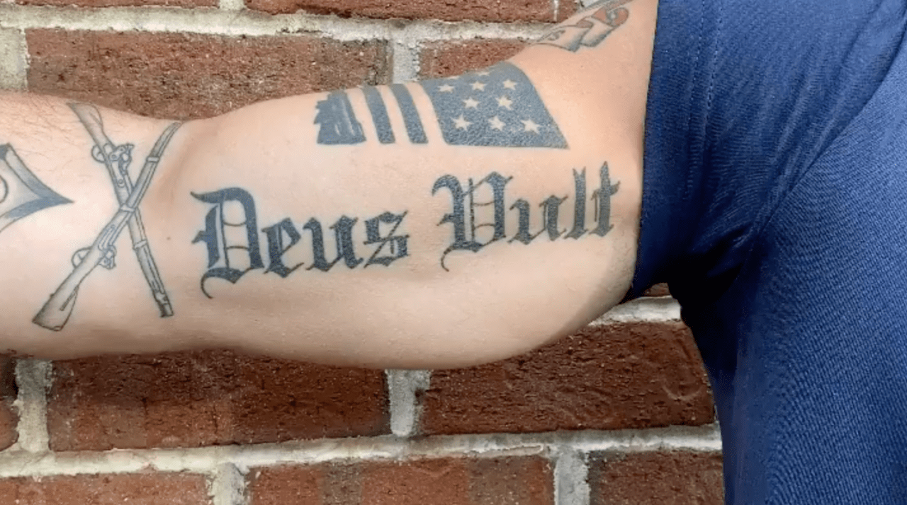 What Do Hegseth's Arm Tattoos Mean?