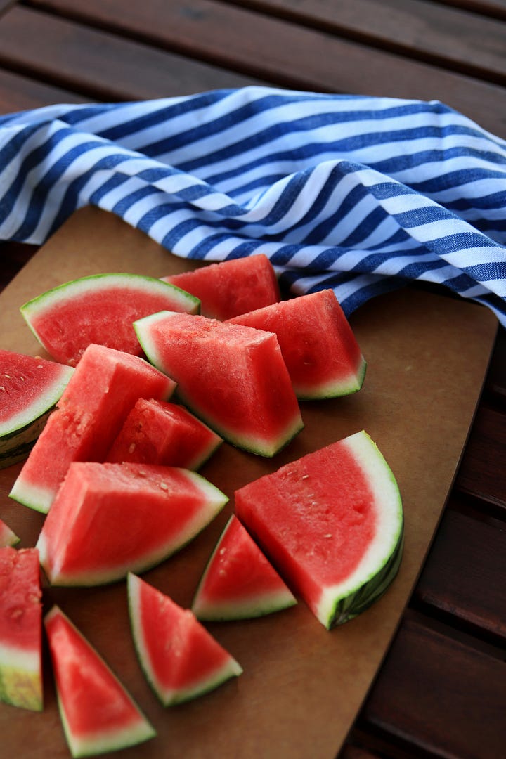 Watermelon lemonade I made blended with ice. Watermelons sliced, photo by Cody Chan via Unsplash
