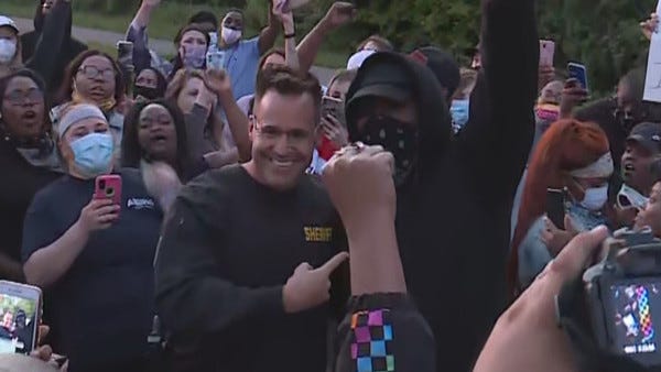 Genesee County Sheriff Chris Swanson joins protesters marching for George Floyd | WEYI Genesee County Sheriff Chris Swanson joins protesters marching for George Floyd | WEYI