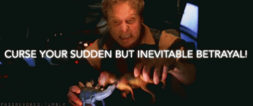 Firefly's Wash plays with toy dinosaurs: "Curse your sudden but inevitable betrayal!"
