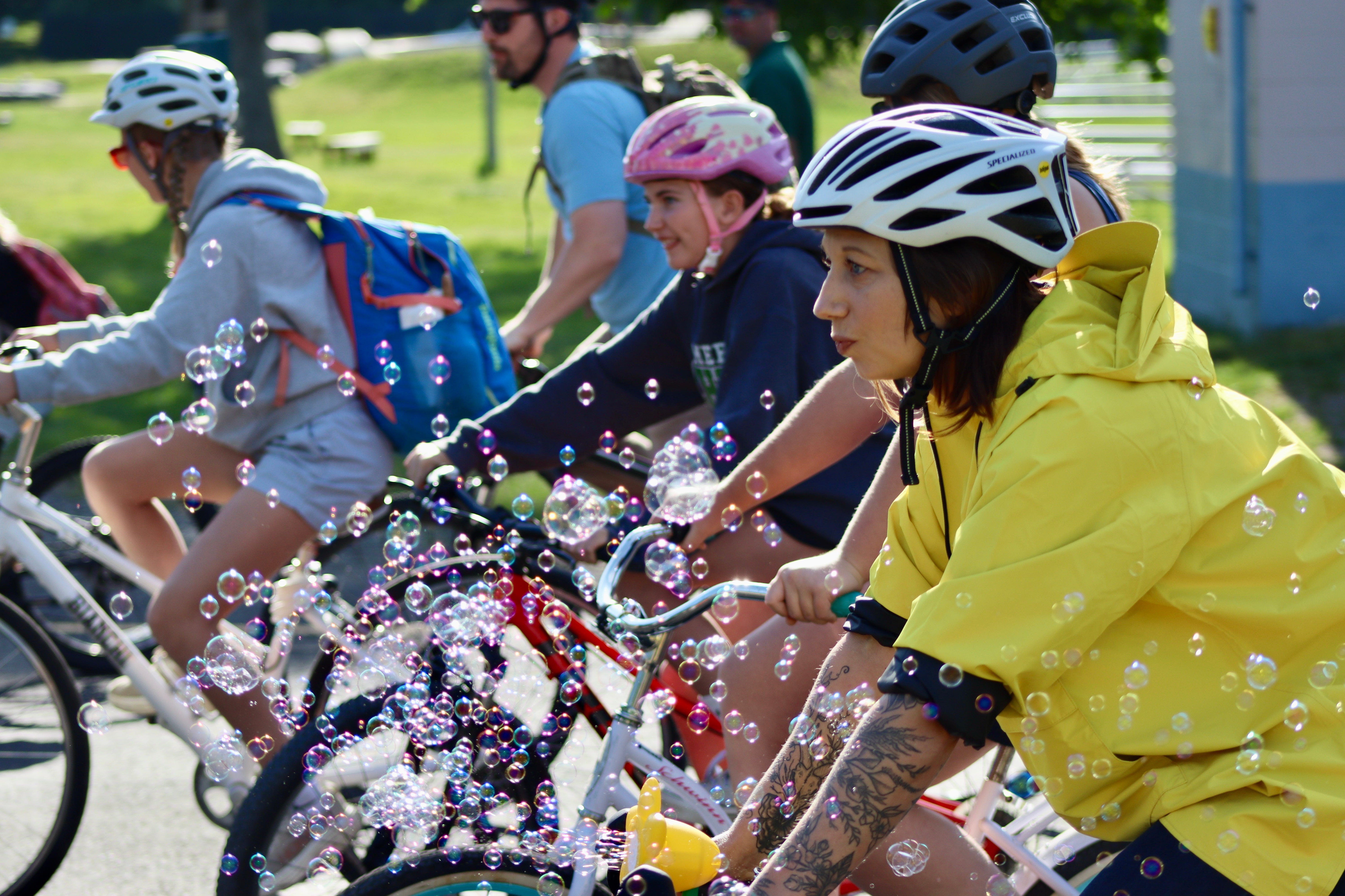 Community Rolls Through Bar Harbor on Final Bike Bus Ride This School Year.