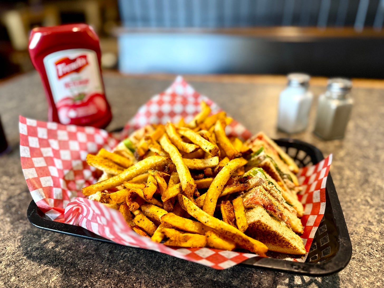 May be an image of club sandwich