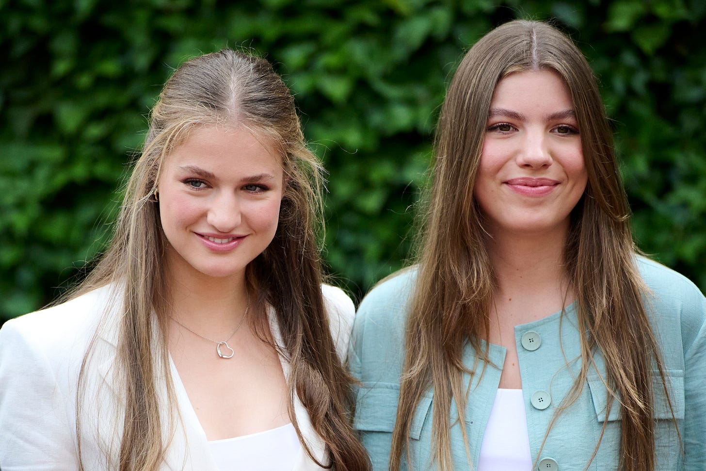 Crown Princess Leonor of Spain and Princess Sofia of Spain smiling next to each other