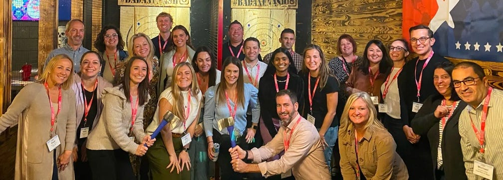A group of people posing for a photo
AI-generated content may be incorrect.