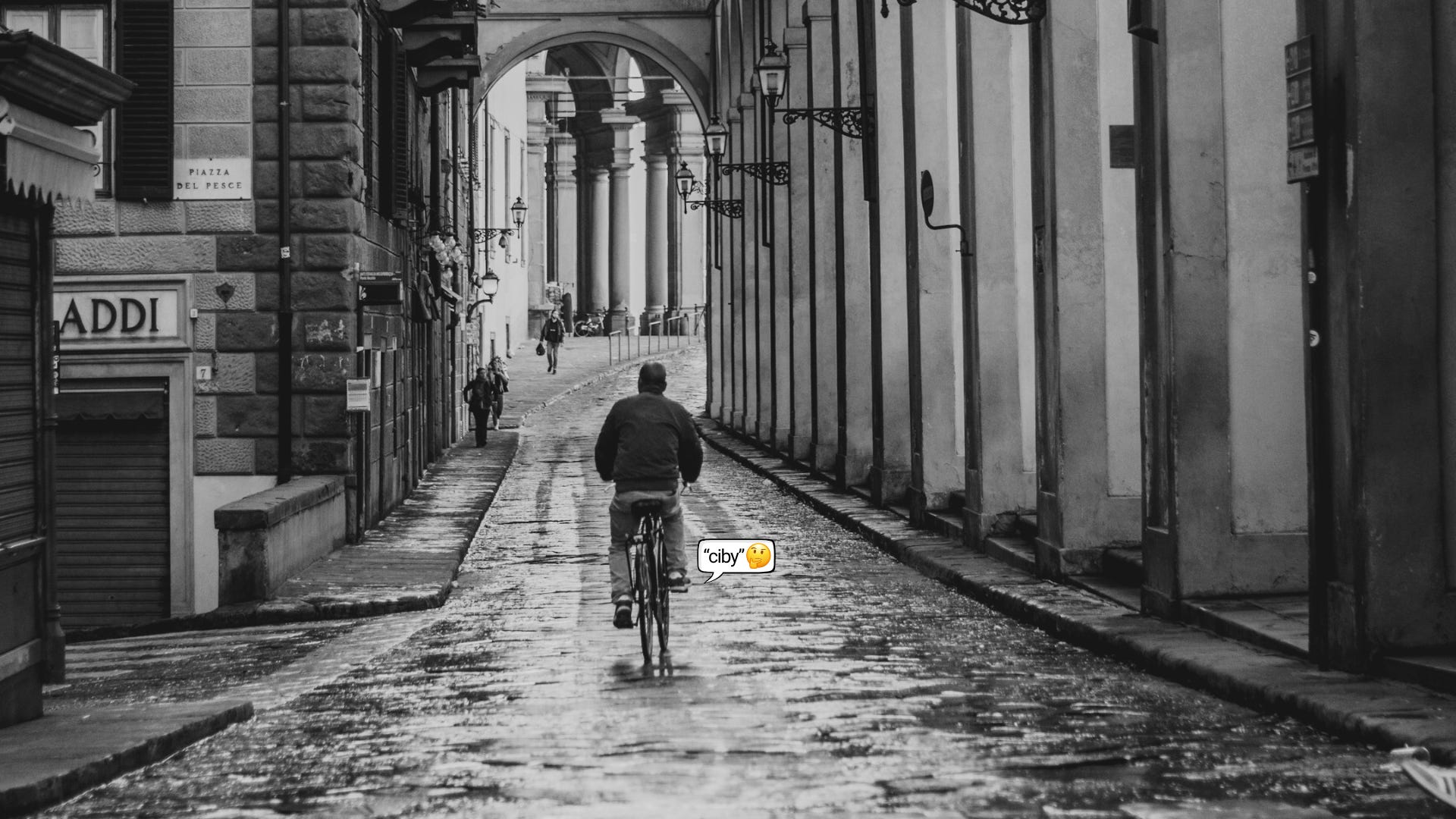 A man riding a bicycle. The image suggests Italy. What about that bicycle? Image credit: william zompi' on Unsplash. Edited to suggest 1940s.
