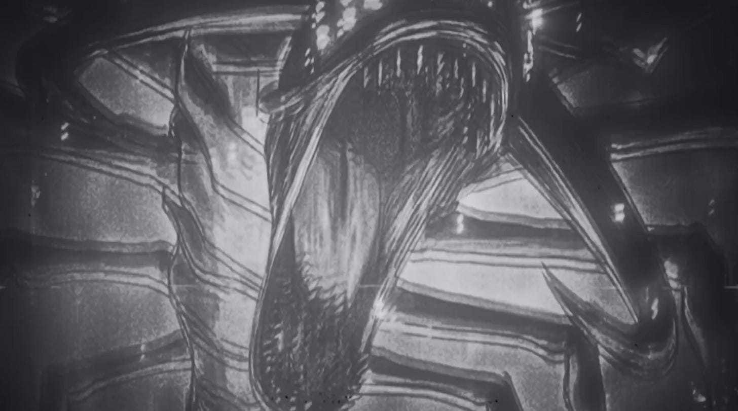 A greyscale shot of a monster with its mouth wide open at the viewer. It has a segmented body with many spidery limbs and sharp teeth. It looks to have many eyes as well.