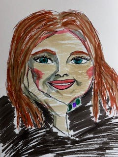 Woman with hand on face and smiling