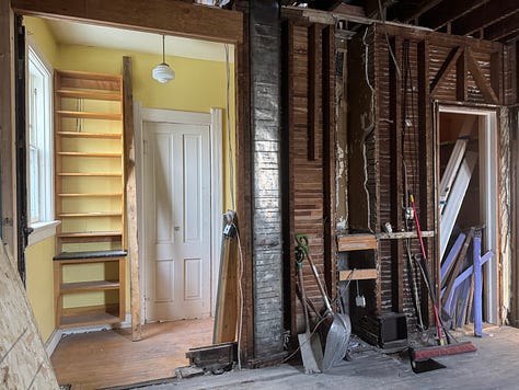 Six photos, three of interior fire damage, two of ongoing repairs, and one of a stack of flooring. 