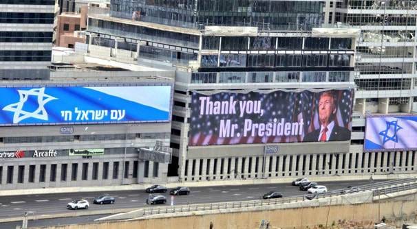 A large billboards on a building

AI-generated content may be incorrect.