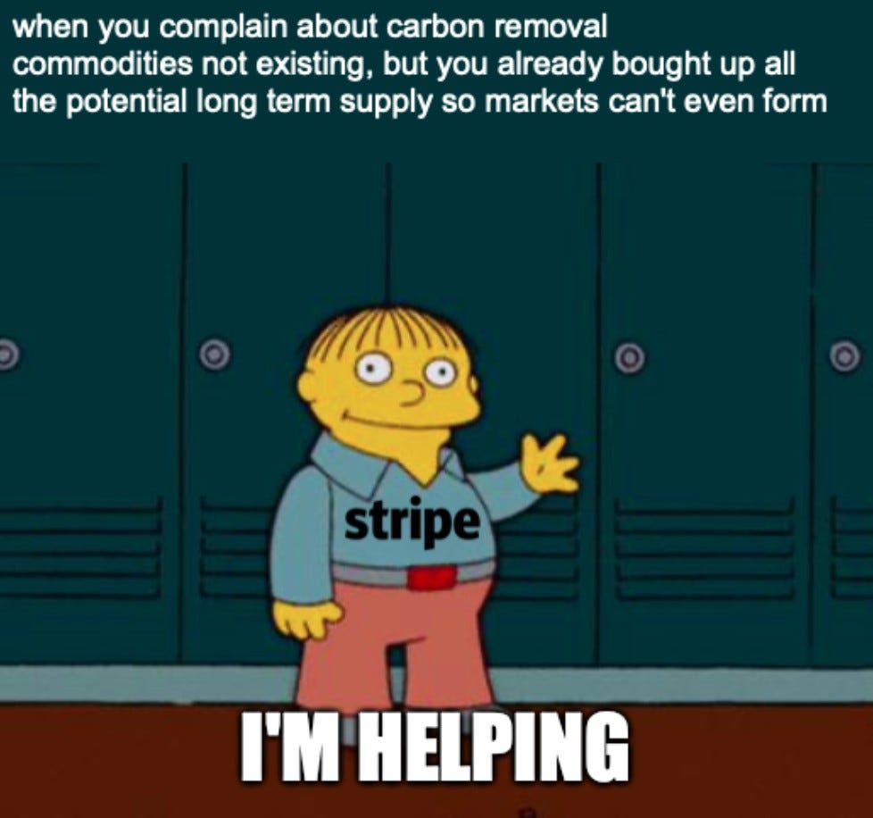 Ralph Wiggum from The Simpsons waves by school lockers, wearing a shirt that reads "stripe". Top text: "when you complain about carbon removal commodities not existing, but you already bought up all the potential long term supply so markets can't even form". Bottom text: "I'M HELPING"