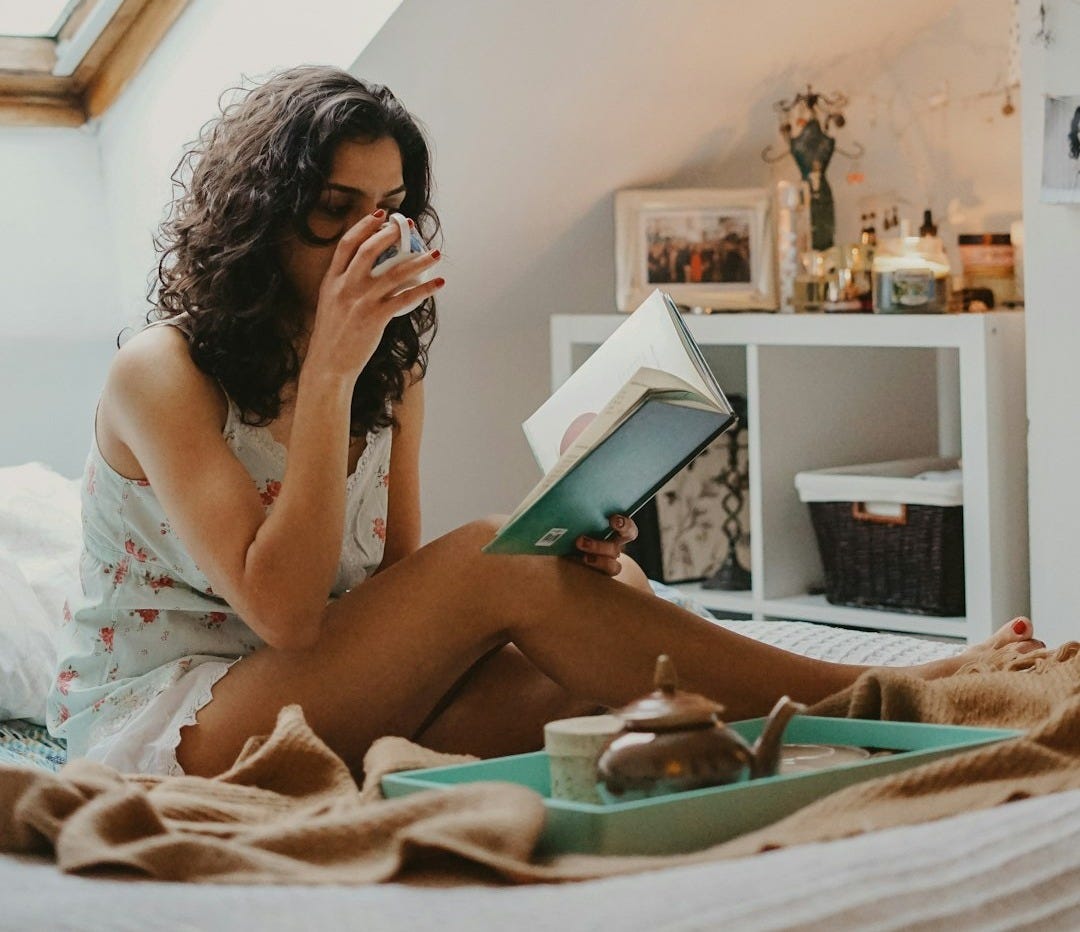 woman holding book