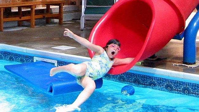 The weirdest water slide faces ever | The Courier Mail