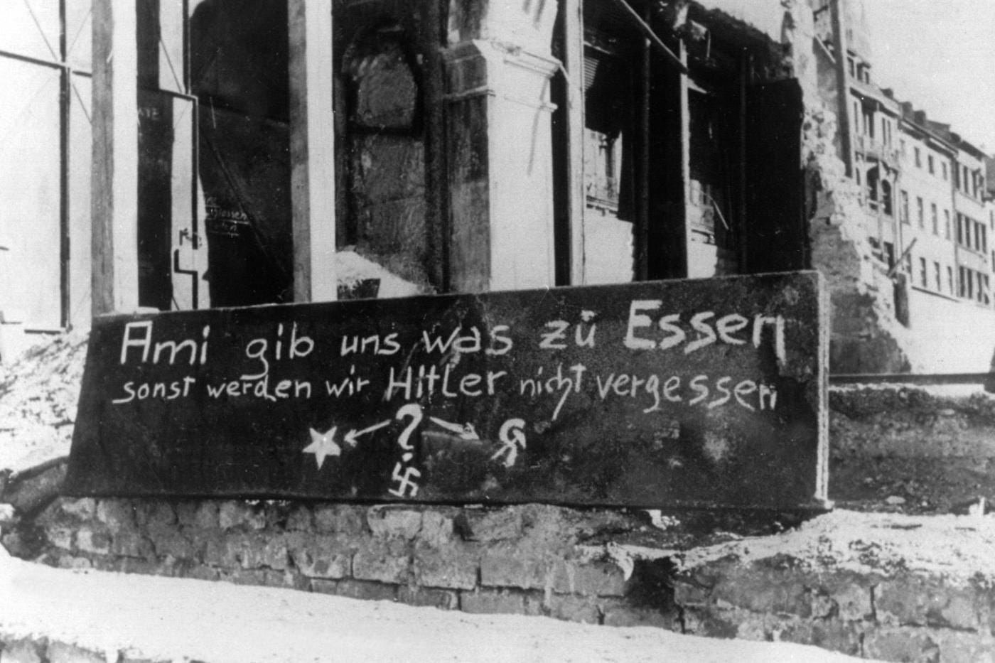 “Americans give us something to eat or we won’t forget Hitler” German graffiti during winter food shortages in Munich (1946) “Americans give us something to eat or we won’t forget Hitler” German graffiti during winter food shortages in Munich (1946)