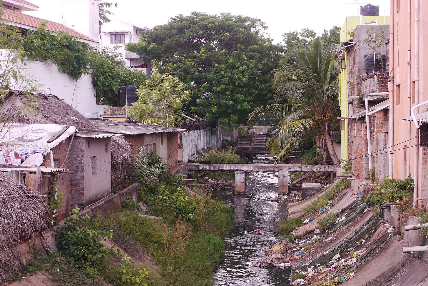 A canal in India's Bengaluru city, where excess water flows into following heavy rainfall. A canal in India's Bengaluru city, where excess water flows into following heavy rainfall.