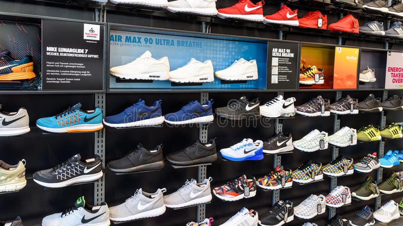 Nike Running Shoes for Sale in Nike Shoe Store Display Editorial Image -  Image of life, sneakers: 65626830