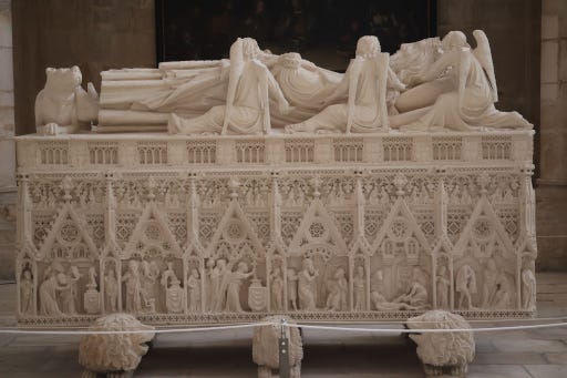 Elaborate royal tomb supported by sculpted lions