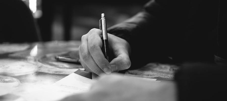 Writing notes with a pen Writing notes with a pen