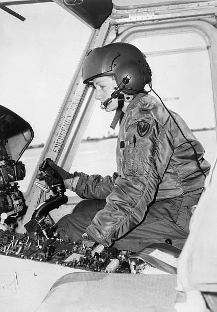 New York, NY- Sally D. Murphy shown here at the controls of the UH-1 "huey" helicopter, is recognized in the U.S. Army at its first woman aviator and...