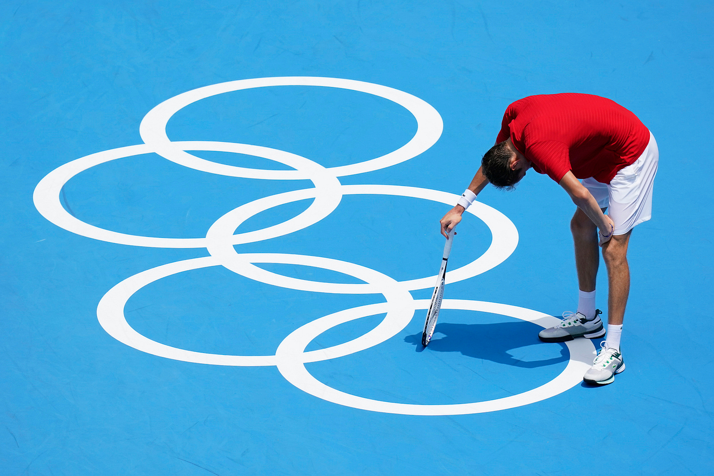 Tennis star says he could 'die' in Tokyo heat, another leaves court in a  wheelchair