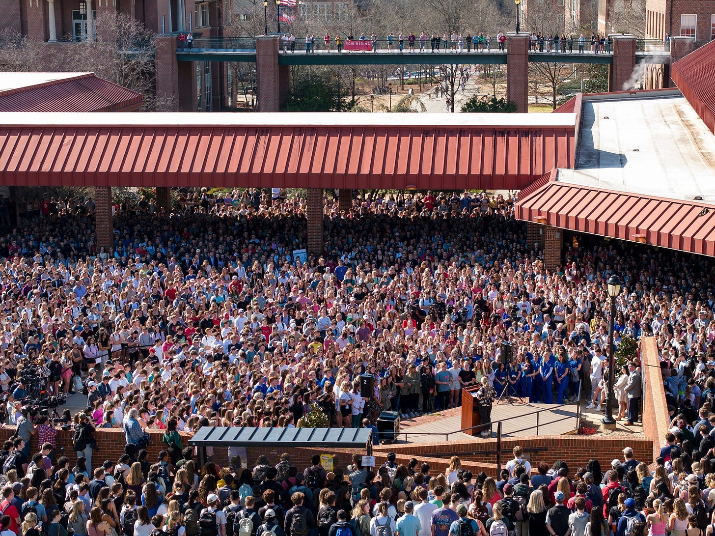 May be an image of crowd and text May be an image of crowd and text