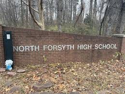 WFMY News 2 reporter Giselle Thomas took a photo of the start of a memorial  at North Forsyth High School following the deadly stabbing.