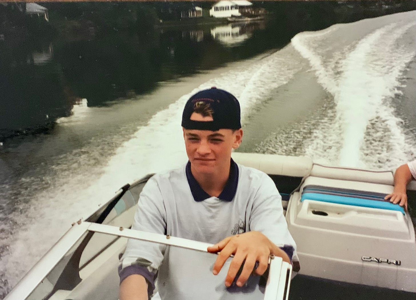 May be an image of 2 people and boat