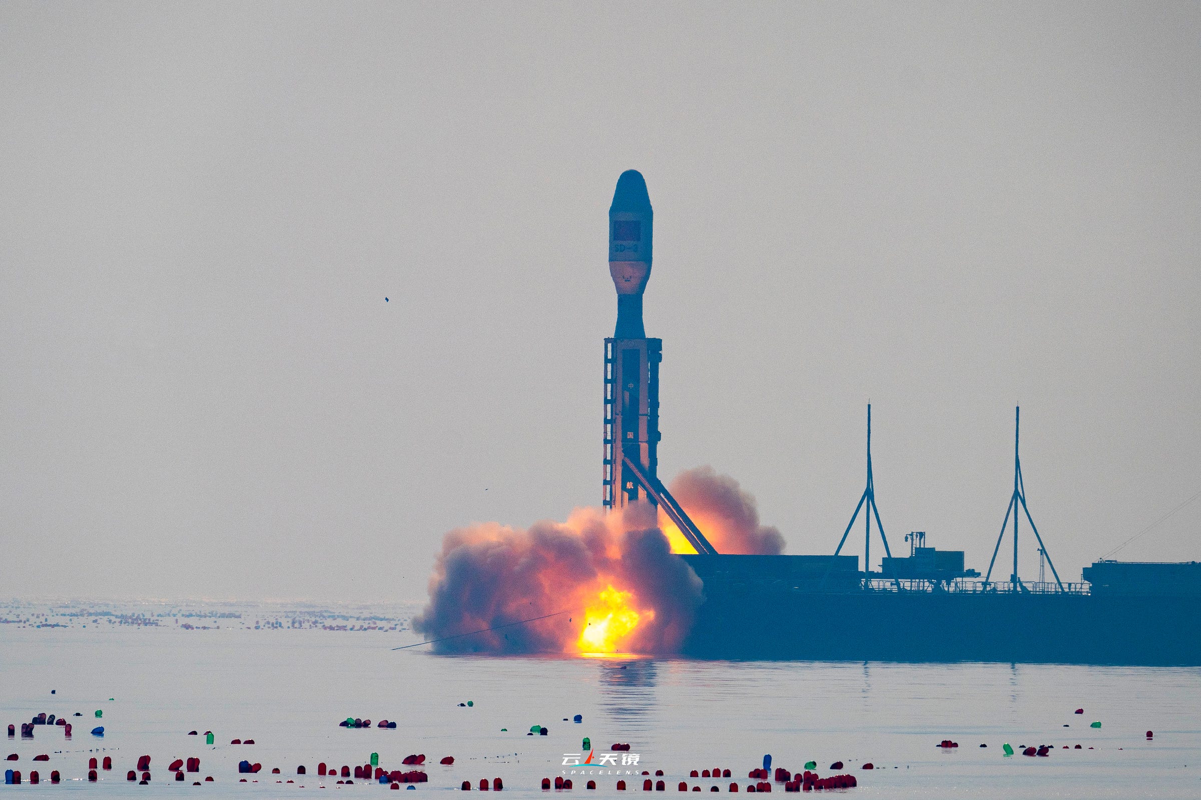 The Jielong-3 Y5 vehicle lifting off from its launch platform in the Yellow Sea. The Jielong-3 Y5 vehicle lifting off from its launch platform in the Yellow Sea.