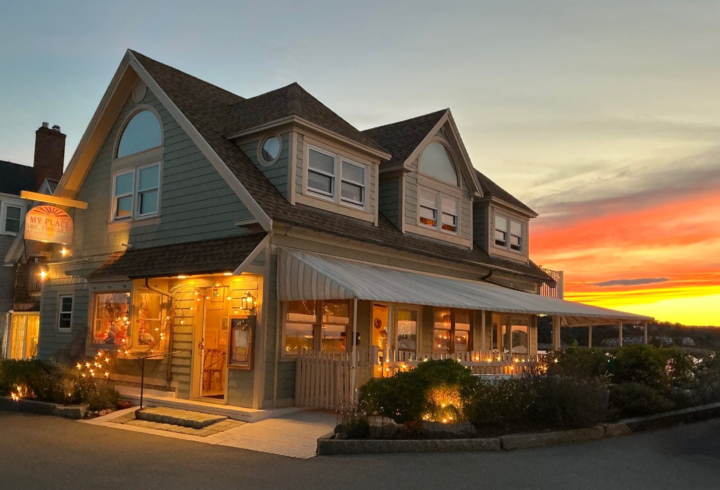 A building with lights on the front

AI-generated content may be incorrect.