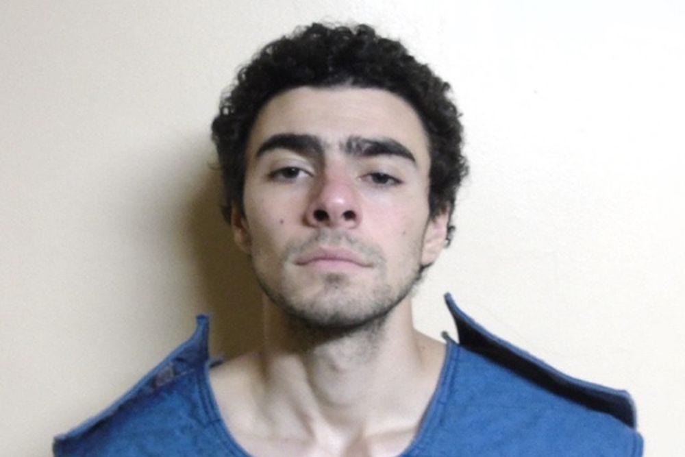 Luigi Mangione's First Jail Photos Released as Family Says They're 'Shocked  and Devastated' After Arrest
