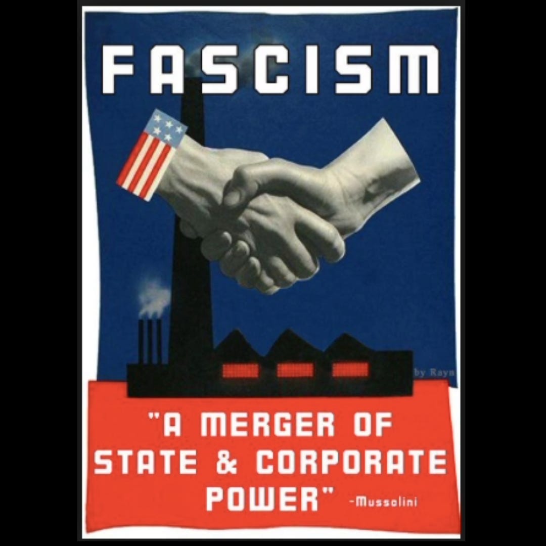 A red white and blue poster with two hands shaking on a deal in front of a stylized image of a factory. The quote "A merger of state & corporate power" is attributed to Mussolini.