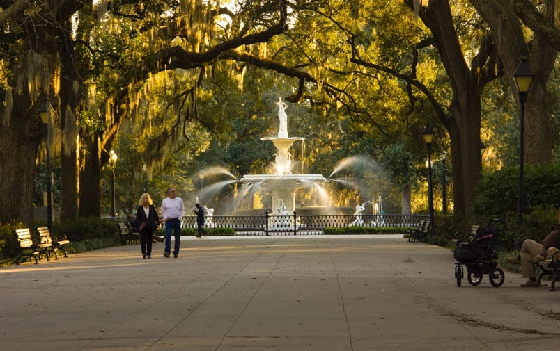 A fountain in a park
Description automatically generated with low confidence A fountain in a park
Description automatically generated with low confidence