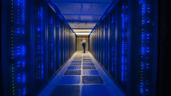 A man is using a super computer