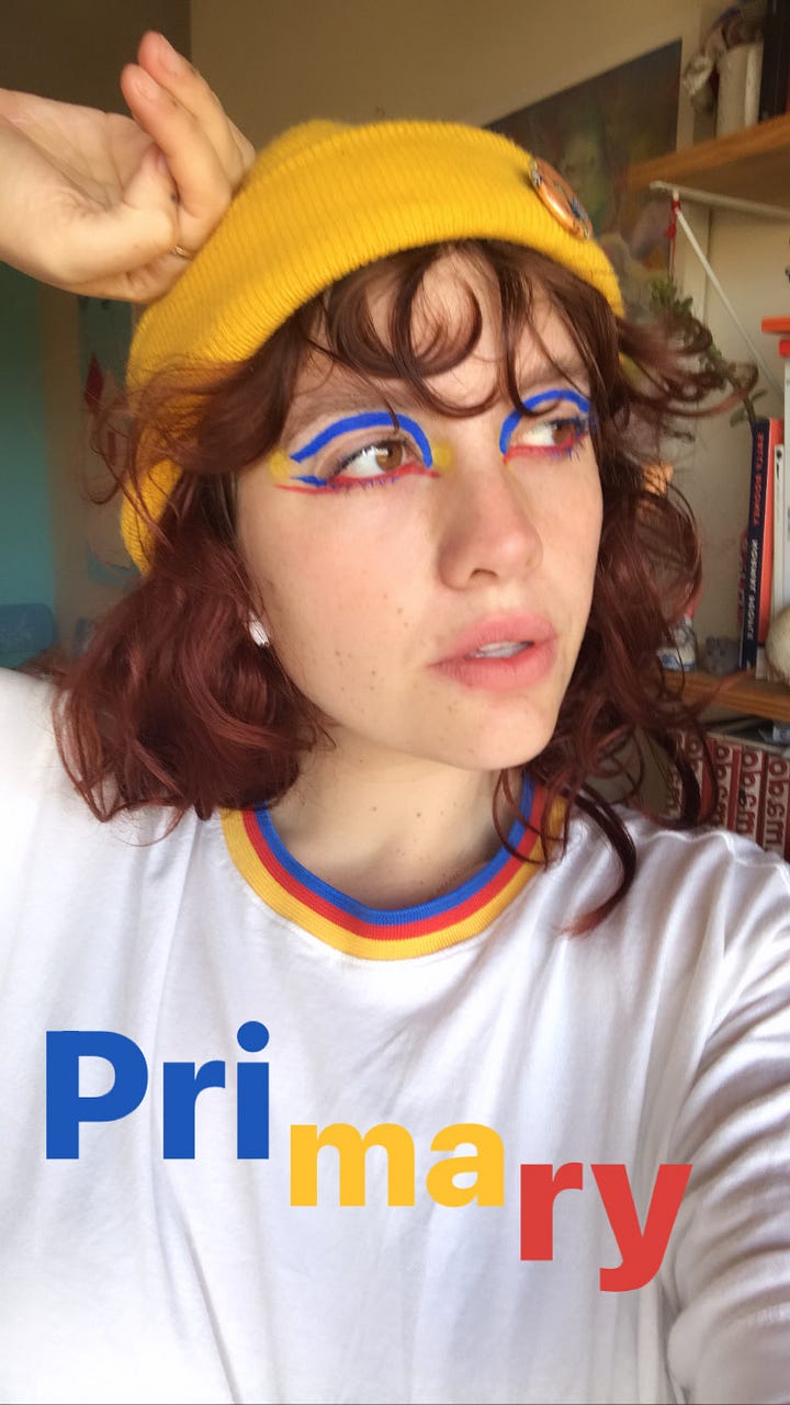 Left: Larissa in a green and pink and purple look (matching eyeshadow/eyeliner). Right: Larissa in a primary color look (also matching eyeshadow/eyeliner).