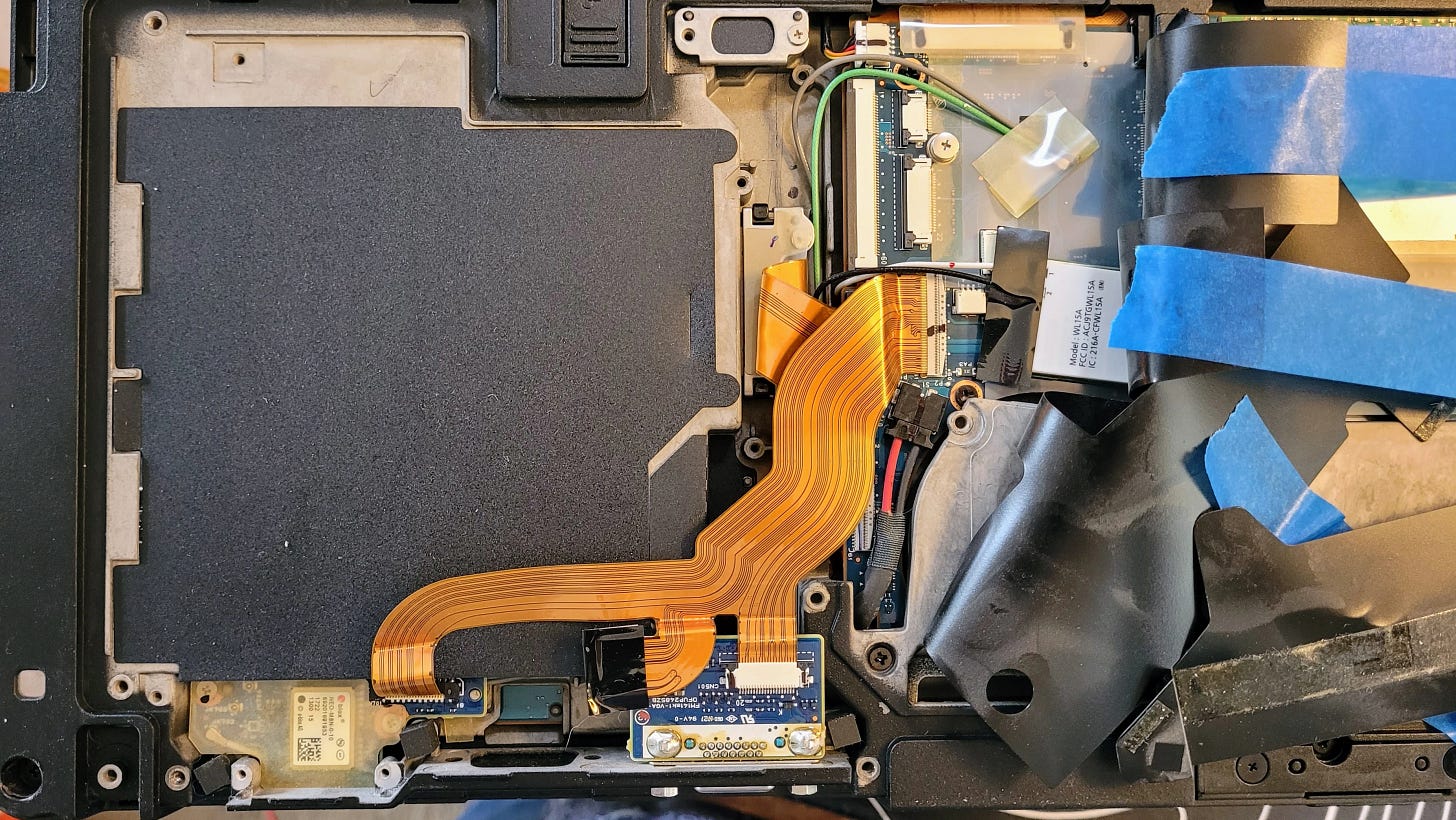 The multi-drive socket is underneath the wide ribbon cable The multi-drive socket is underneath the wide ribbon cable