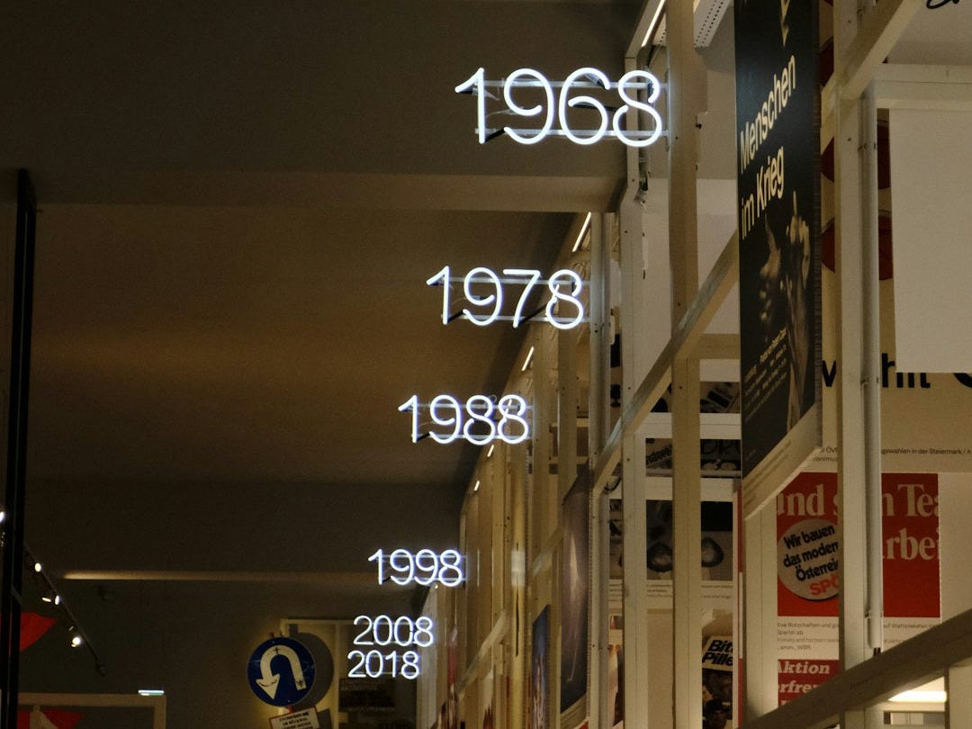 a group of people walking in a street