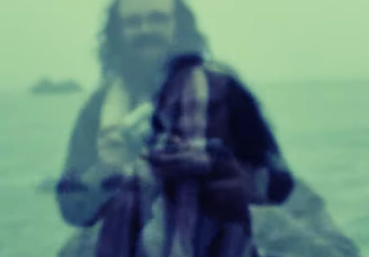 A person with long hair and a beard

AI-generated content may be incorrect.