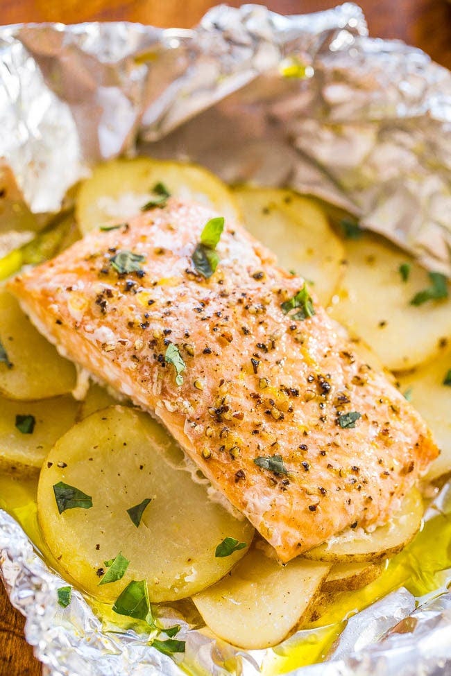 Easy Salmon and Potato Foil Packets - Juicy, moist salmon that's loaded with flavor! Ready in 30 minutes, zero cleanup, and a foolproof way to cook salmon and look like a gourmet cook!! Easy Salmon and Potato Foil Packets - Juicy, moist salmon that's loaded with flavor! Ready in 30 minutes, zero cleanup, and a foolproof way to cook salmon and look like a gourmet cook!!