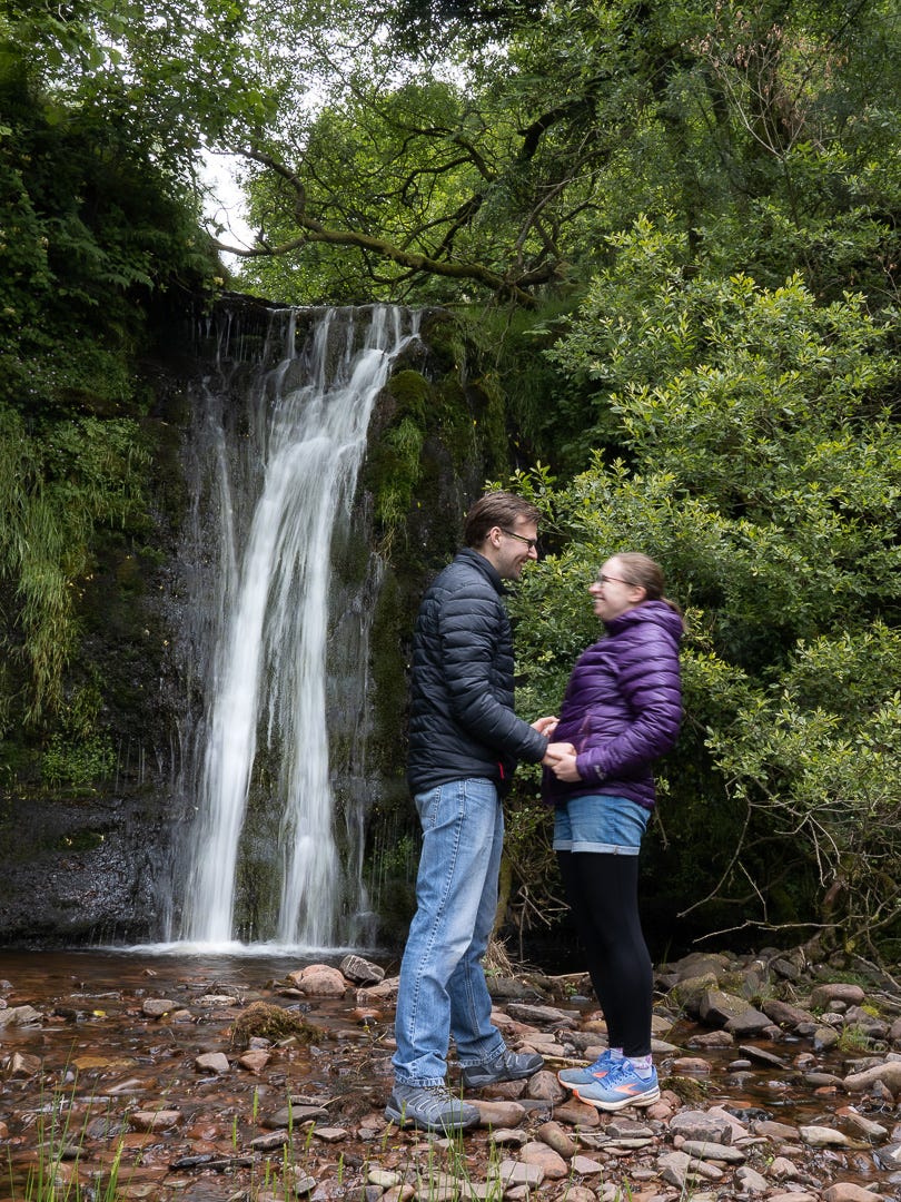 Dancing in front of a waterfall in the Brecon Beacons