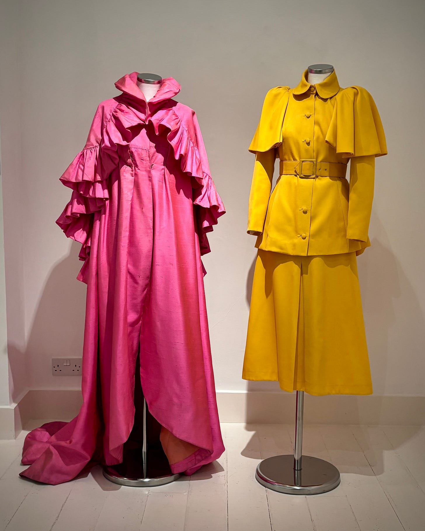 From Fenella Fielding Wardrobe . Pink Dress with frill cape, Yellow caped jacket and skirt suit form Fenella Fieldings wardrobe Archive 