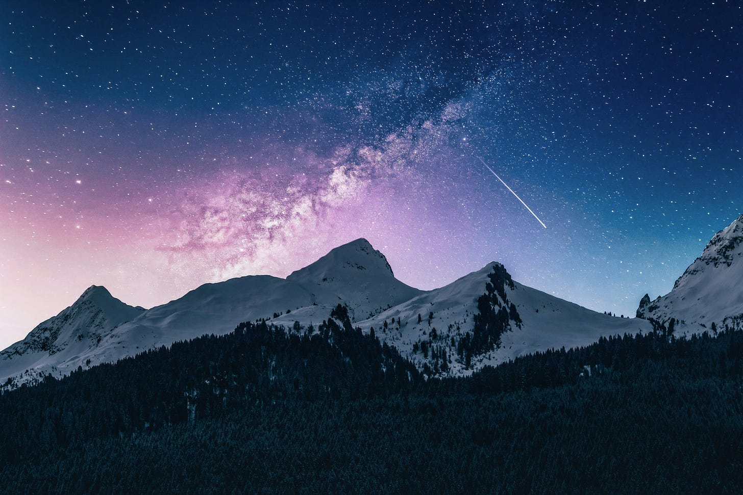 a view of a mountain range under a starry sky with meteor a view of a mountain range under a starry sky with meteor