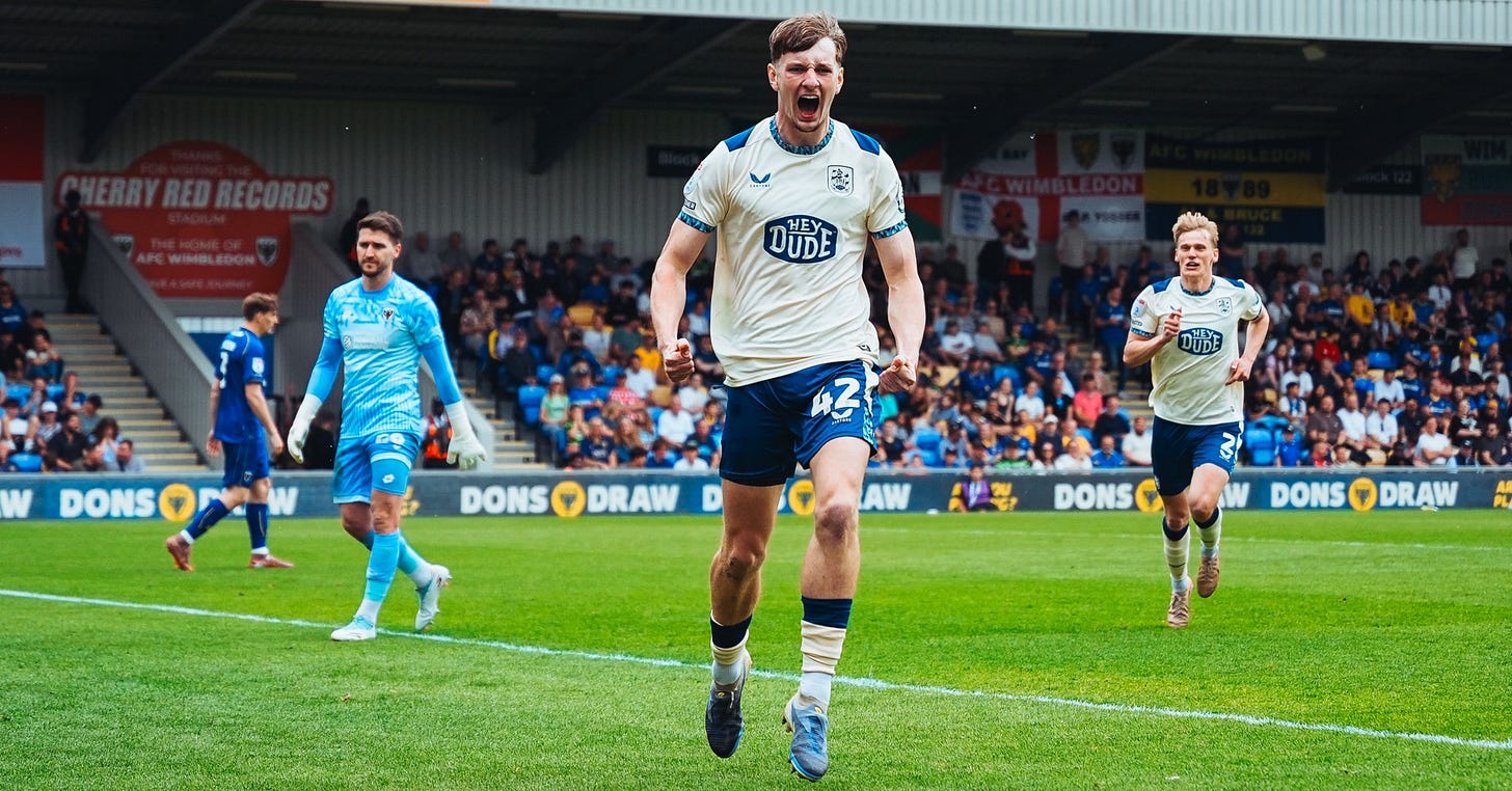 Huddersfield Town’s George Sebine celebrates scoring a goal at AFC Wimbledon. Huddersfield Town’s George Sebine celebrates scoring a goal at AFC Wimbledon.