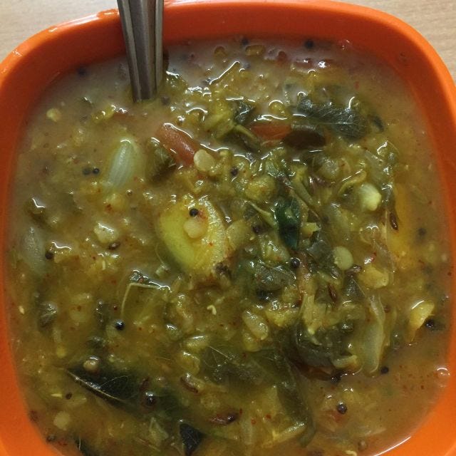 A close up of dal with gongura, onions and mustard. A close up of dal with gongura, onions and mustard.