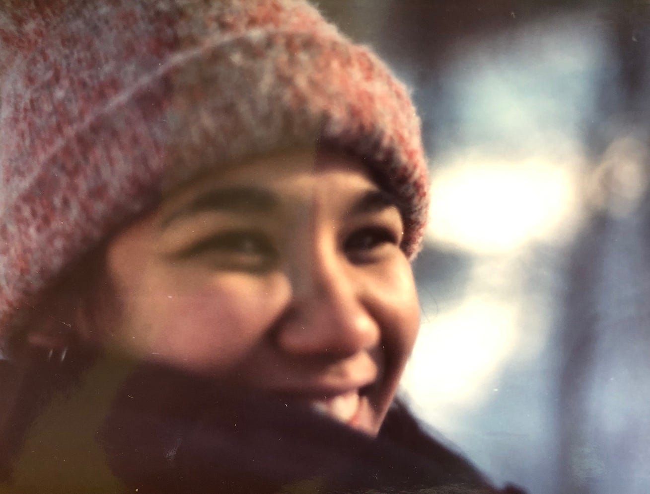 Angeline smiling, in the 1980s.