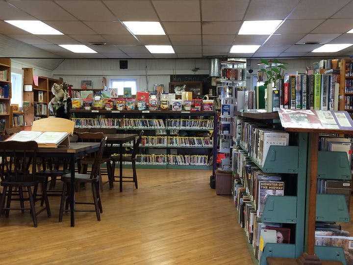 Full library and empty library room
