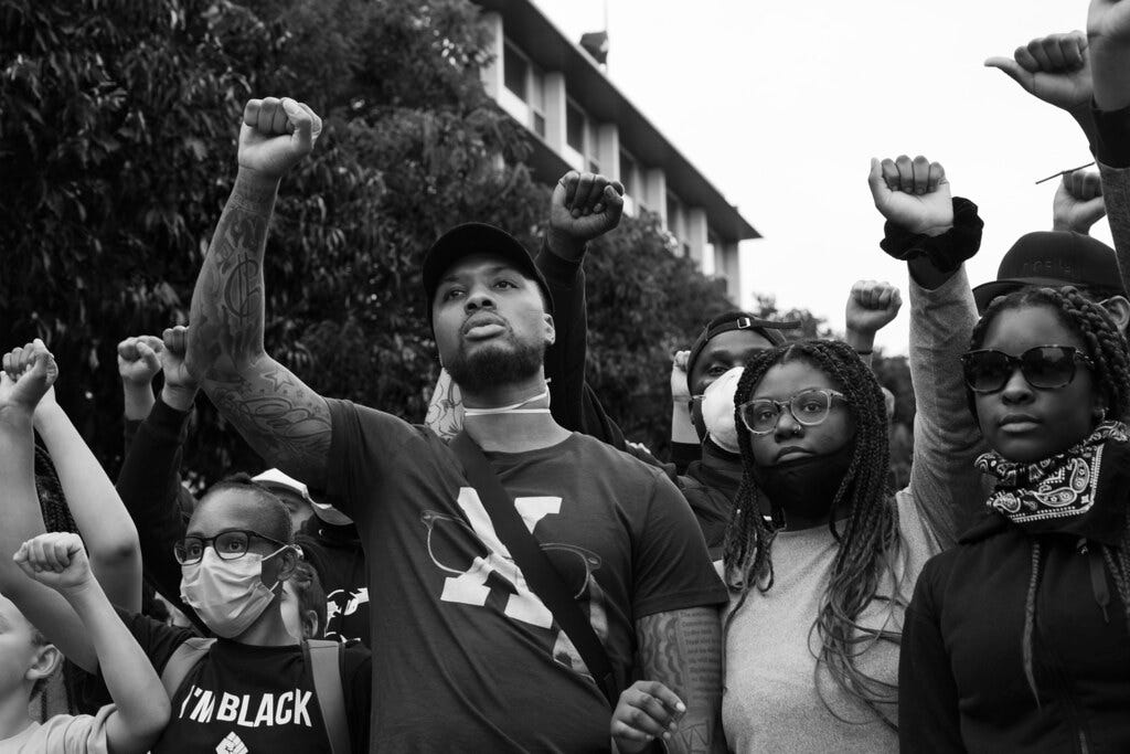 Damian Lillard at the Black Lives Matter march in Portland Damian Lillard at the Black Lives Matter march in Portland