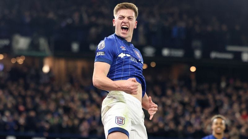 Liam Delap gives a roar of delight, jumping in the air as he celebrates scoring his penalty