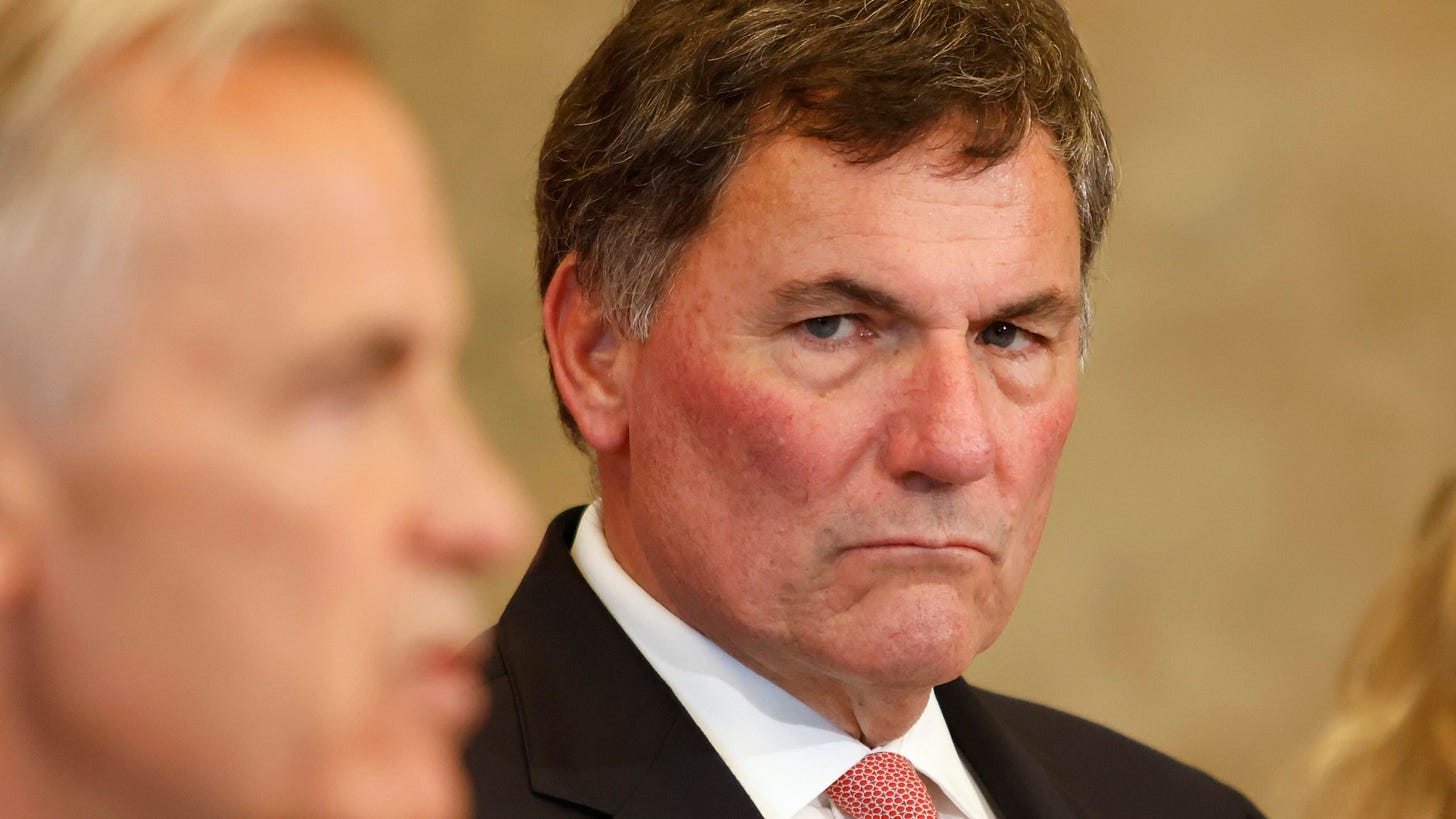 Canada-U.S. Trade Minister Dominic LeBlanc listens as Prime Minister Mark Carney speaks about Canada's response to new U.S. tariffs during a news conference on Parliament Hill in Ottawa on Saturday, Aug. 22, 2026. (Patrick Doyle/The Canadian Press via AP)