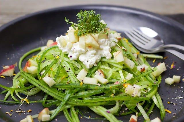 Salad of young cabbage with cucumbers and spinach
