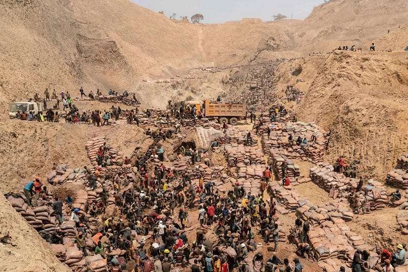 Artisanal miners work at the Shabara mine near Kolwezi in southeastern Democratic Republic of the Congo. Some 20,000 people work at Shabara in shifts of 5,000 at a time.